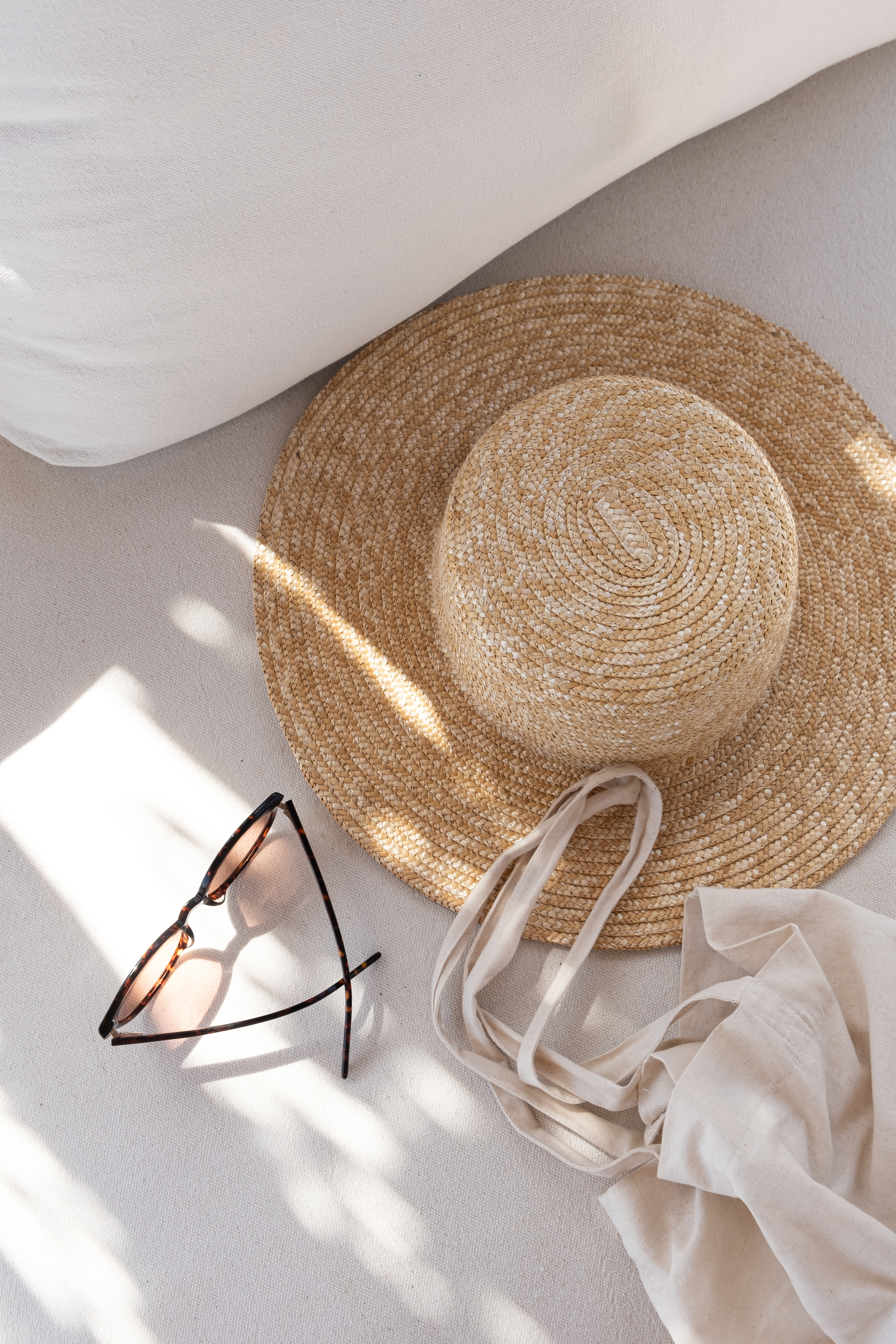 Summer Travel Items with Sunglasses, Hat, and Tote Bag